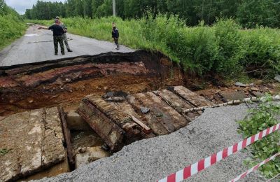 В Кизеловском округе сильный ливень разрушил мост
